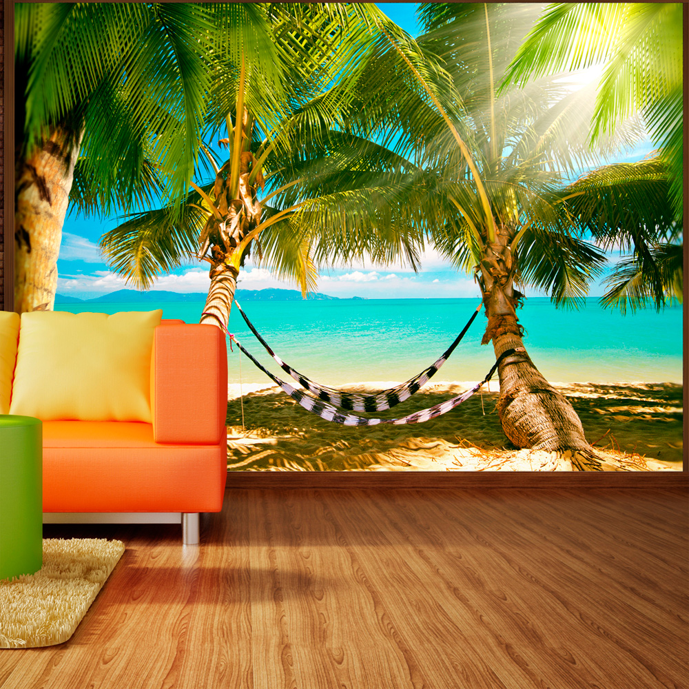 ARTGEIST Fototapet med motiv af hængekøjer i solstråle under palmetræer på strand (flere størrelser) 100x70