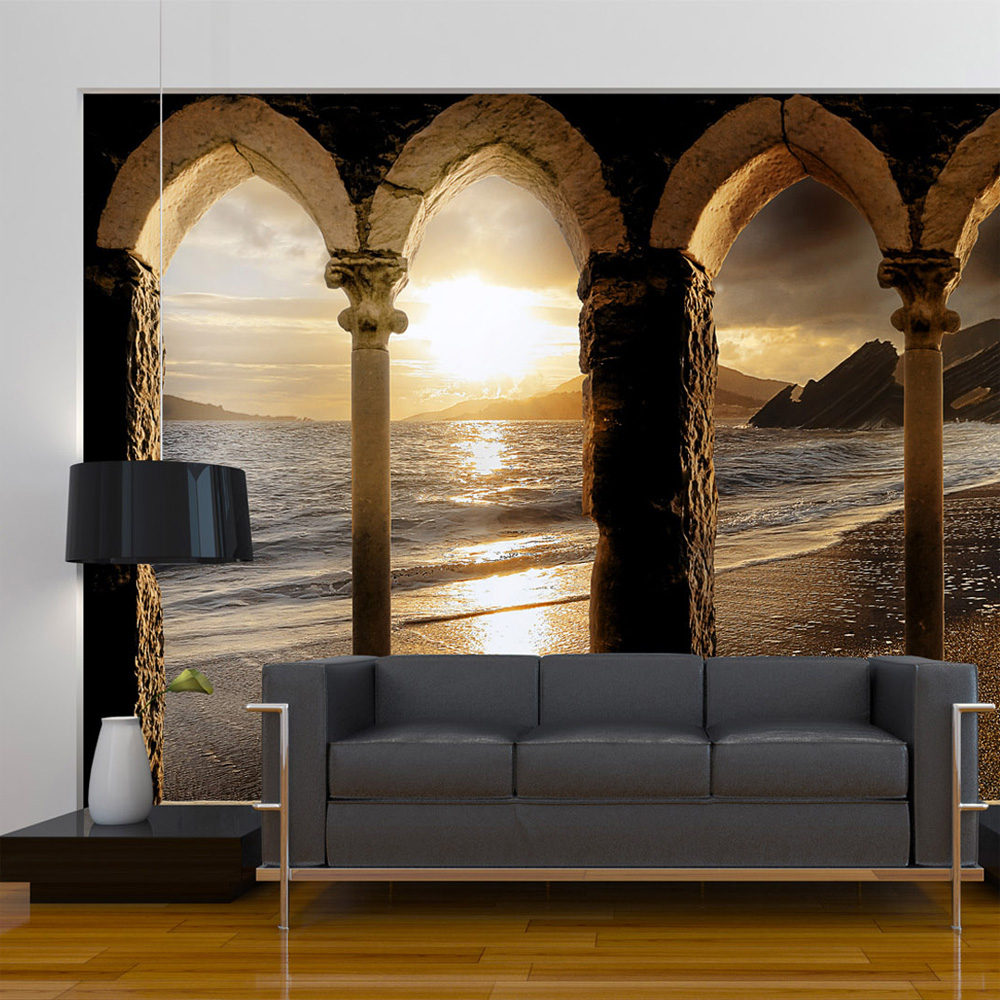 ARTGEIST Fototapet med motiv af arkitektur og udsigt til solnedgang ved stranden (flere størrelser) 100x70