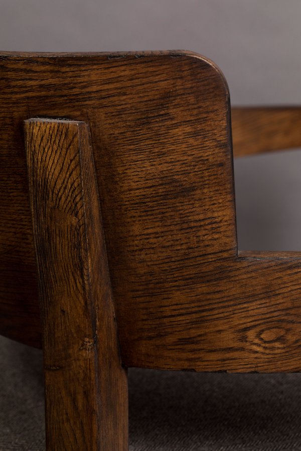 DUTCHBONE Duran Loungesessel, mit Armlehnen – graues Polyester und braune Eiche