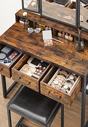 VASAGLE Schminktisch, mit dreifach klappbarem Spiegel, 3 Schubladen, 4 Fächern, Hocker – braune Spanplatte, schwarzer Stahl (90 x 40)