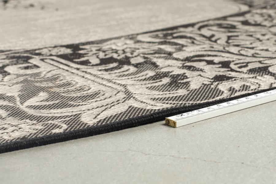 ZUIVER Coventry utendrs teppe, rundt - svart polyester/decolan (280)