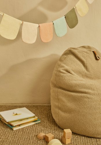 KAVE HOME Vicka puff i beige boucl, 70 cm