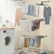 SONGMICS LLR701W01 B�rbart t�rkestativ med hjul, 4 niv�er, sammenleggbart, 63,5 x 128 x 173 cm, stor kapasitet, enkel montering, innend�rs og utend�rs bruk, hvit