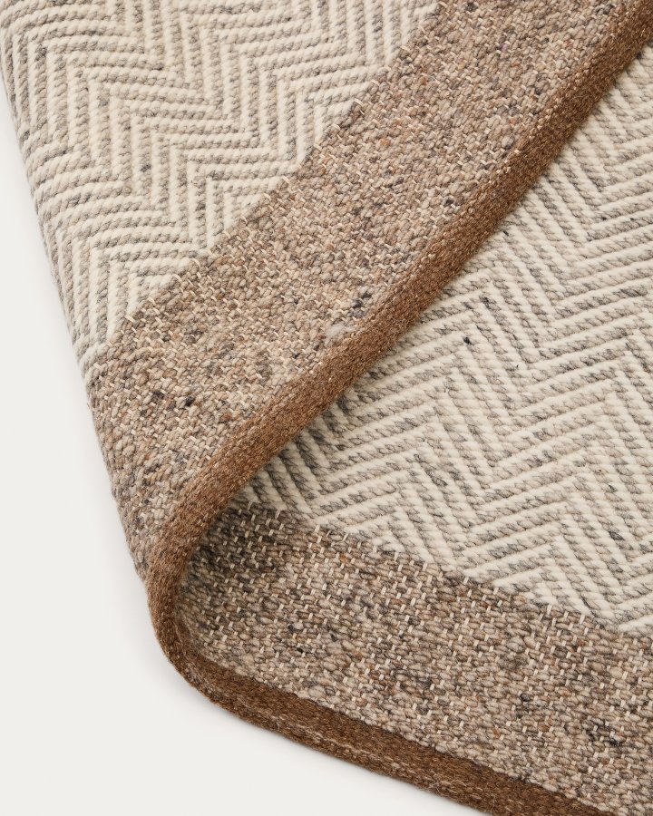 KAVE HOME Nifelia jacquardteppe i beige ull, 160 x 230 cm