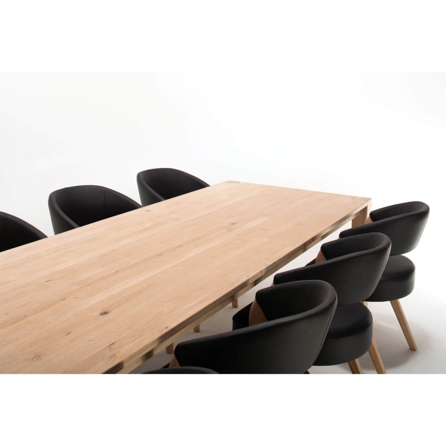 NocNoi Brokholm spisestuestol - svart imitert skinn og ben av eik, med armlener