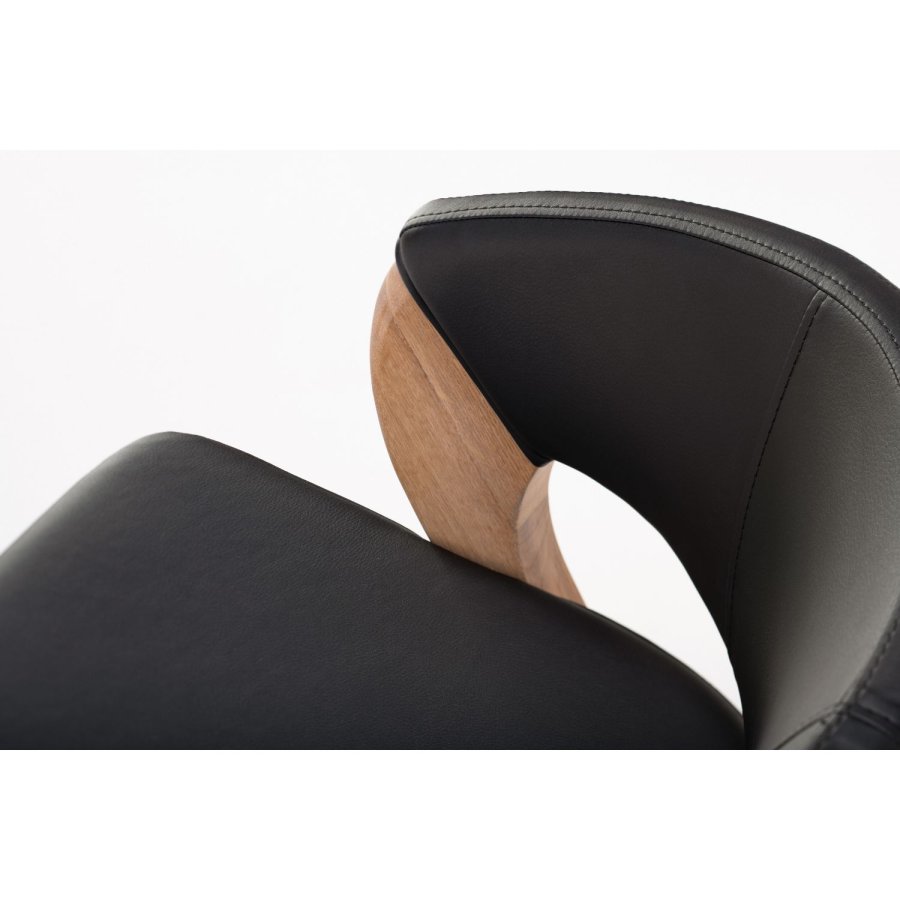 NocNoi Brokholm spisestuestol - svart imitert skinn og ben av eik, med armlener