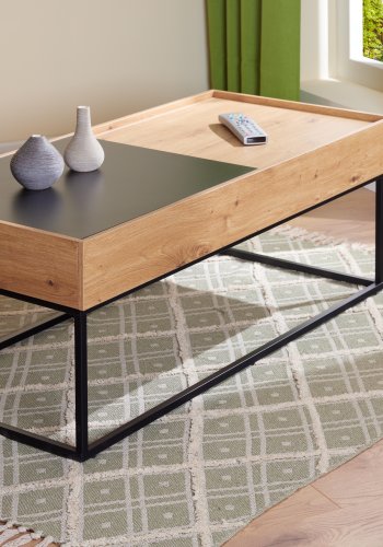 NORDIC LIVING COLLECTION Filora salongbord i svart eik med h�ndlaget finish og god plass p� bordplaten.
