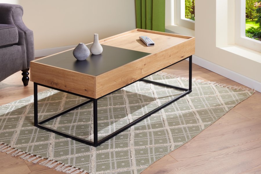 NORDIC LIVING COLLECTION Filora salongbord i svart eik med h�ndlaget finish og god plass p� bordplaten.