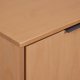 NORDIC LIVING COLLECTION Moderne kommode laget av heltre furu, lakkert i eik. Stabil base takket v�re en svart metallramme, h�ndtak i svart metall av h�y kvalitet, god oppbevaringsplass med �n skuff. To hyller bak to d�rer.